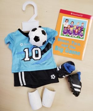 soccer outfit and book