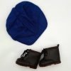 A navy blue cap and brown laced boots
