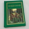 The doll sized copy of Robin Hood with and illustration on the green and gold cover.