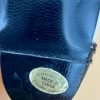 Bottom of boots. Made in China sticker.